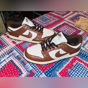 Nike White and Brown Low-Top Dunks.